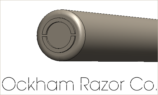 Monogram on the end of the razor handle