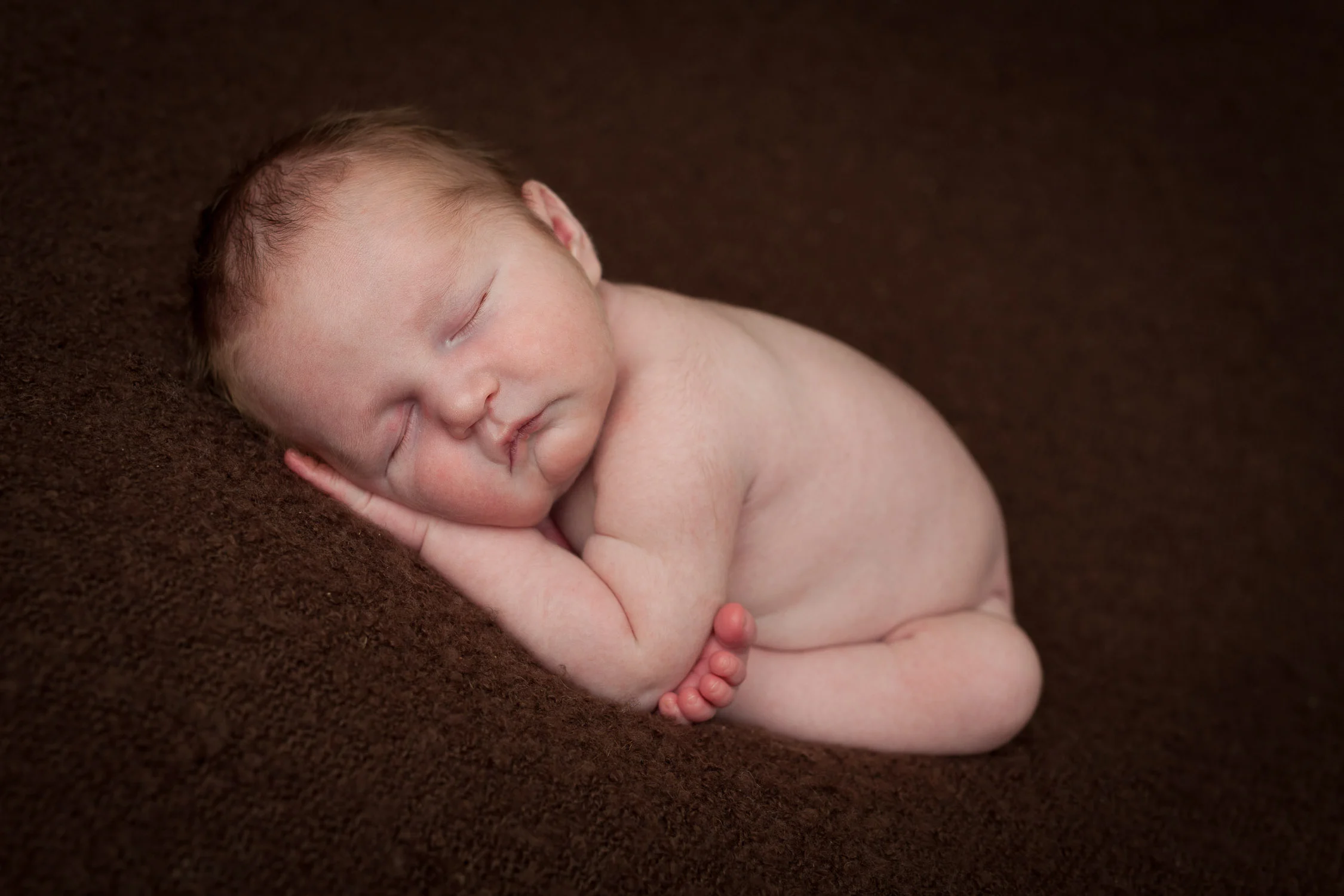 Lille Markus på 7 dager sine nyfødtbilder