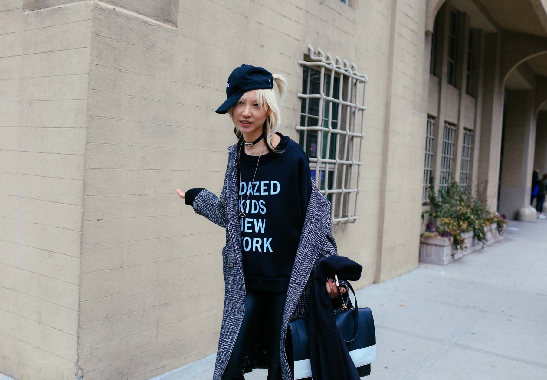 Soo Joo Park in a DKNY sweatshirt