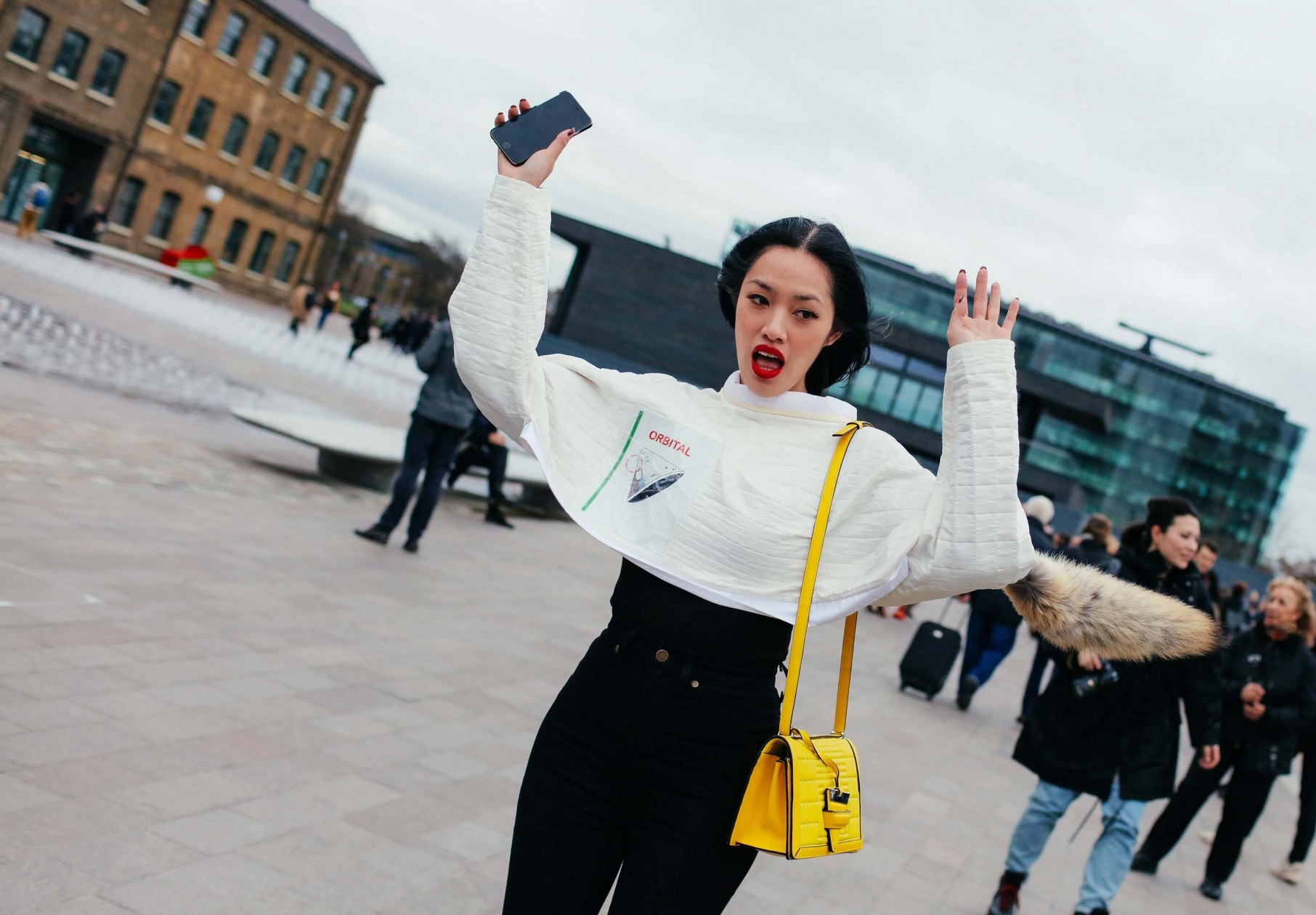 Tiffany Hsu in a J.W. Anderson top with a Loewe bag