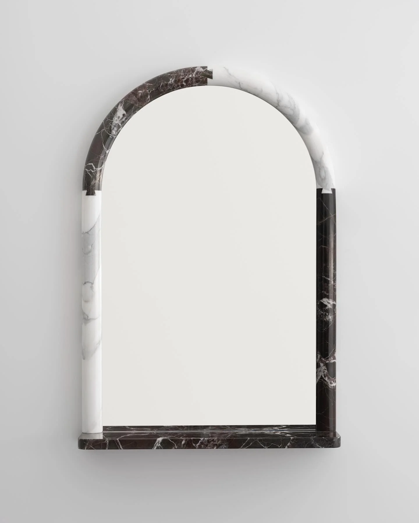 Exploration in Stone..
.
Marble Jointed Mirror 
Shown in Roso Levanto &amp; Statuary Marble
.
D: 6&rdquo; W: 24 3/4&rdquo; H: 37&rdquo;
.
Captured by @joeinstakramm
.
#marbledesign #entrymirror #contemparydesign #interiordecor #design
