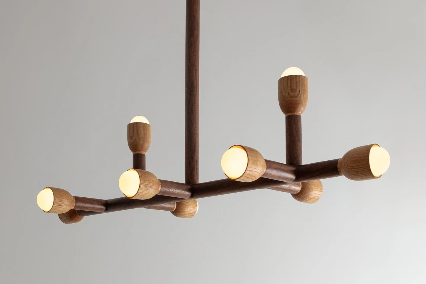 Our new Branch Chandelier shown in solid Walnut with Red Oak Globes.. A study in balance and proportions.
.
Shown in a 9 globe cluster.
.
#sculpturallighting #customlighting #designcollector #interiordesigninspo #ad100