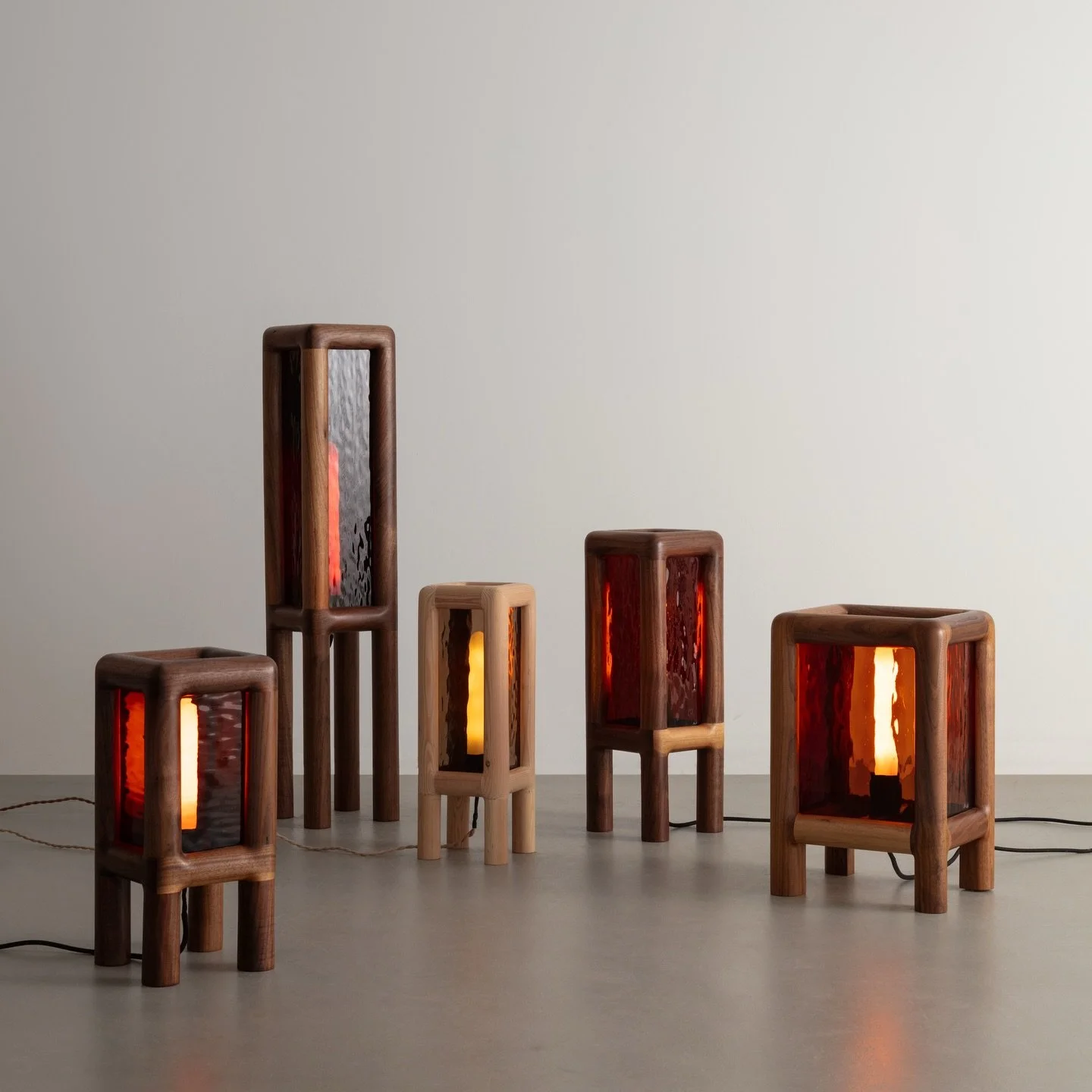 A lighting study from the studio.

These lamps are hand-sculpted and assembled in my New Jersey workshop, combining hardwood elements with stained glass panels that cast a soft, ambient glow.

Materials and glass tones vary from piece to piece, and t