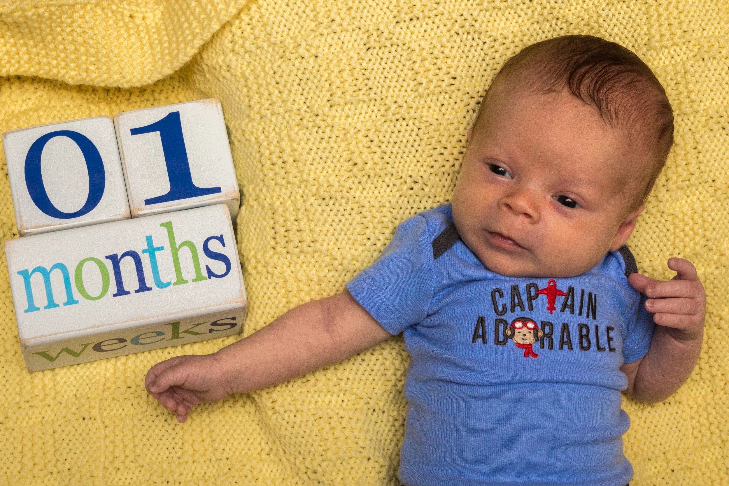 One month old. He truly is Captain Adorable.