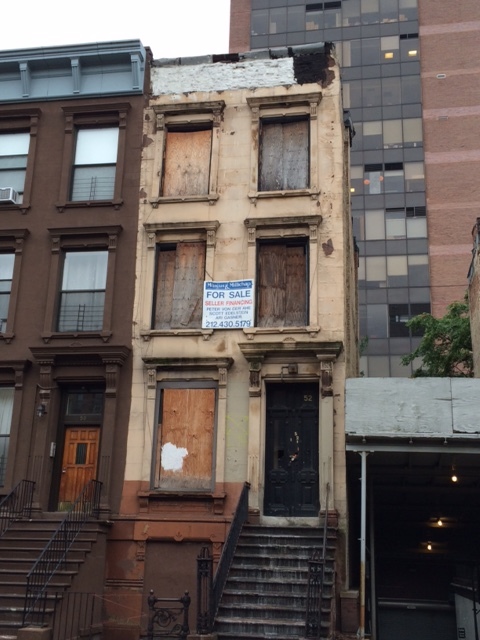 Central Harlem brownstone in need of a lot of work