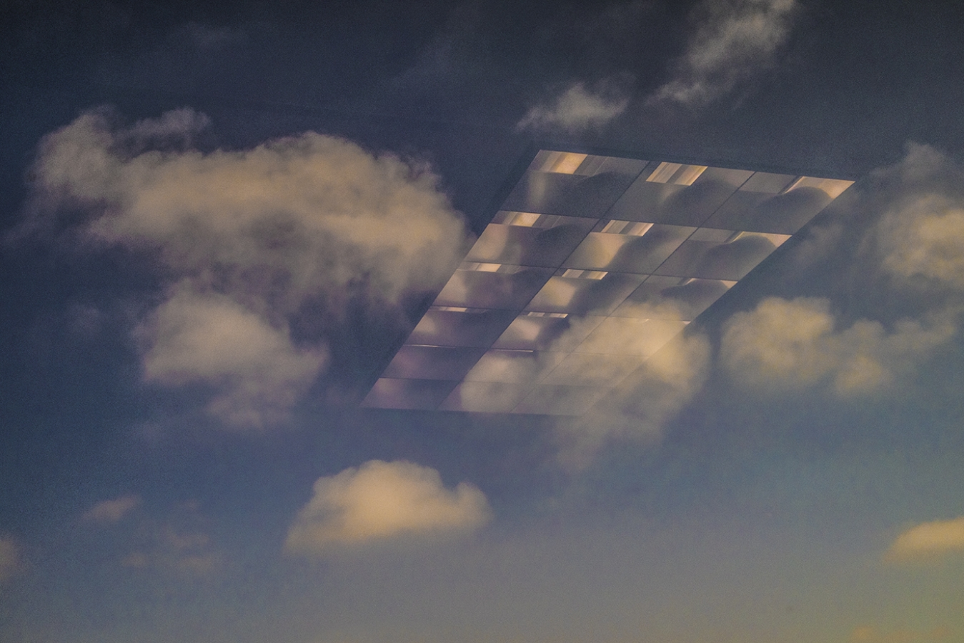 “WINDOW REFLECTIONS AND CLOUDS“ BY STEPHANIE SYDNEY