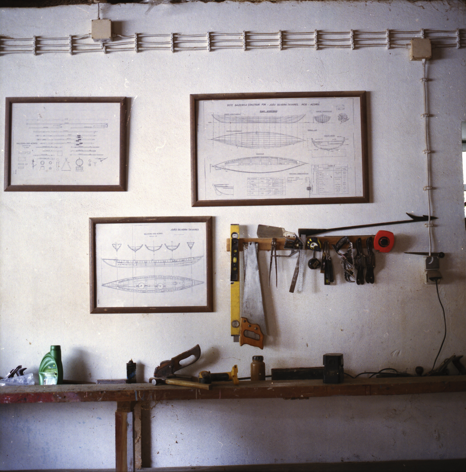 Whaling-boat plans hanging on the wall of Mestre João's workshop.