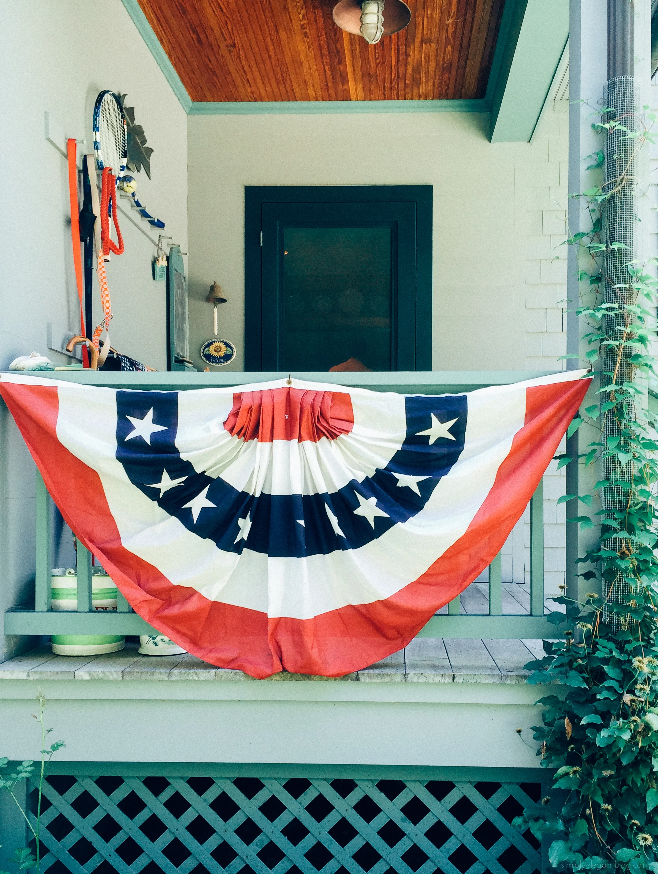 my mom added some patriotic flair to our front porch