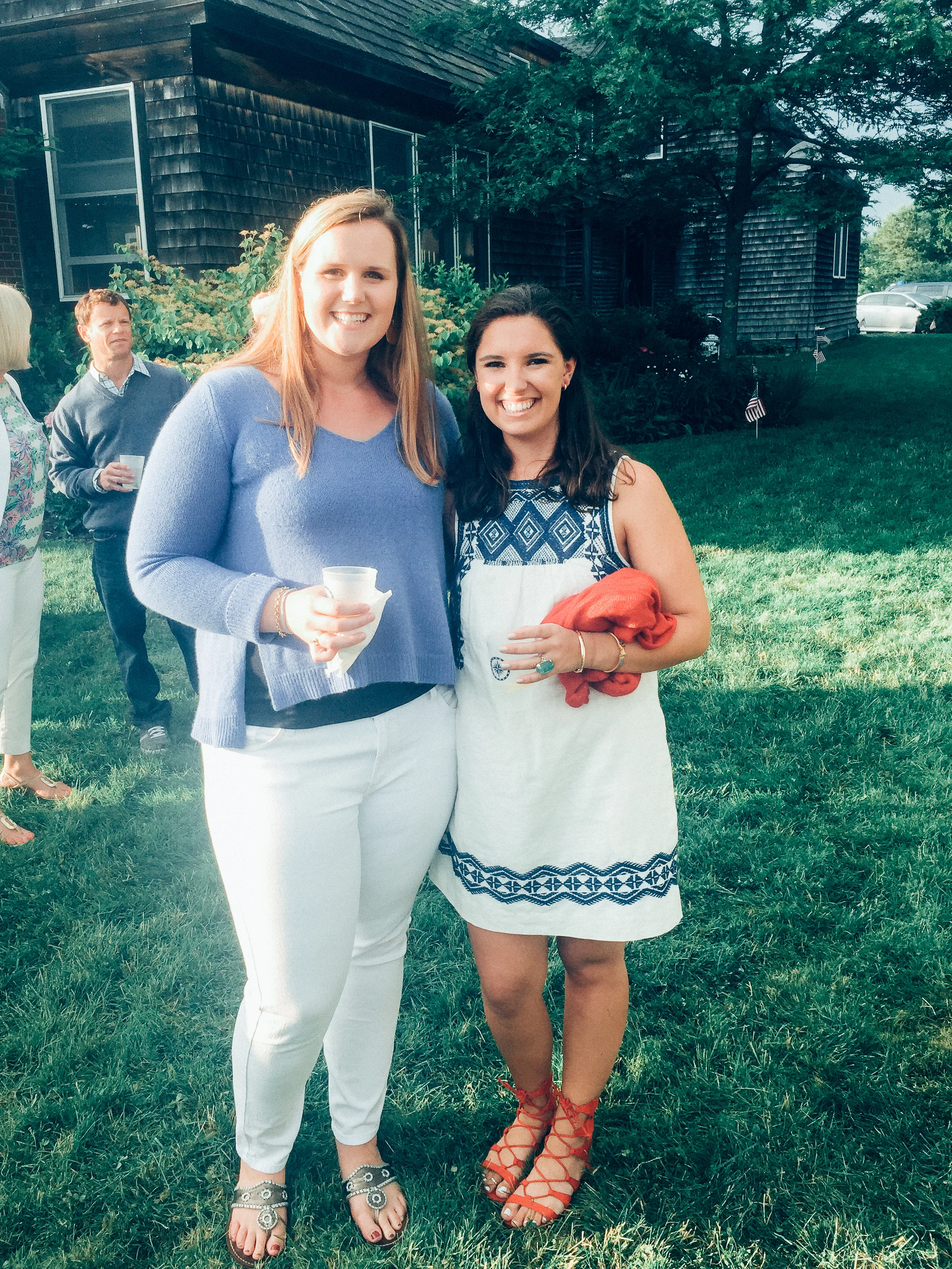 at a 4th of July party with one of my oldest friends, Izzy. Nan= Calypso Sweater (similar), White Denim, Jack Rogers. Izzy = Madewell Dress, Red Sandals. 