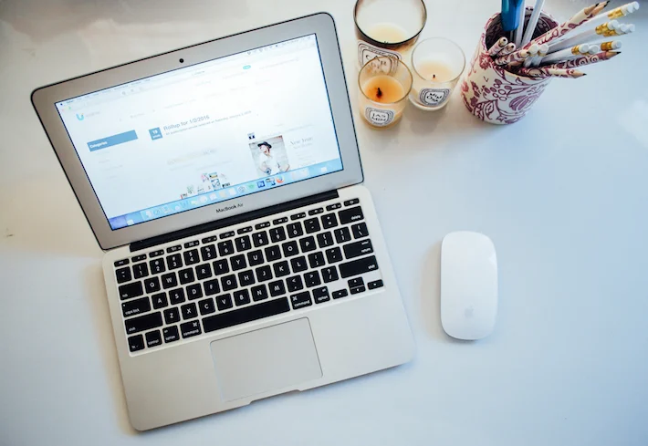 MY DESK: MacBook Air, Wireless Mouse, Diptyque Mimosa, Diptyque Jasmin, Diptyque Gardenia, Il Papiro Pen Holder. 