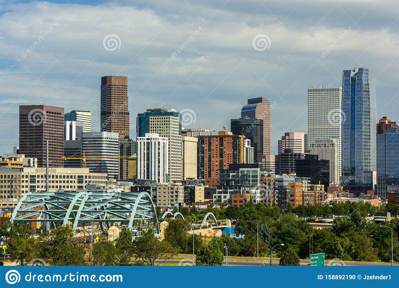 downtown-denver-colorado-skyscrapers-confluence-park-speer-blvd-platte-river-bridges-foreground-158892190.jpg