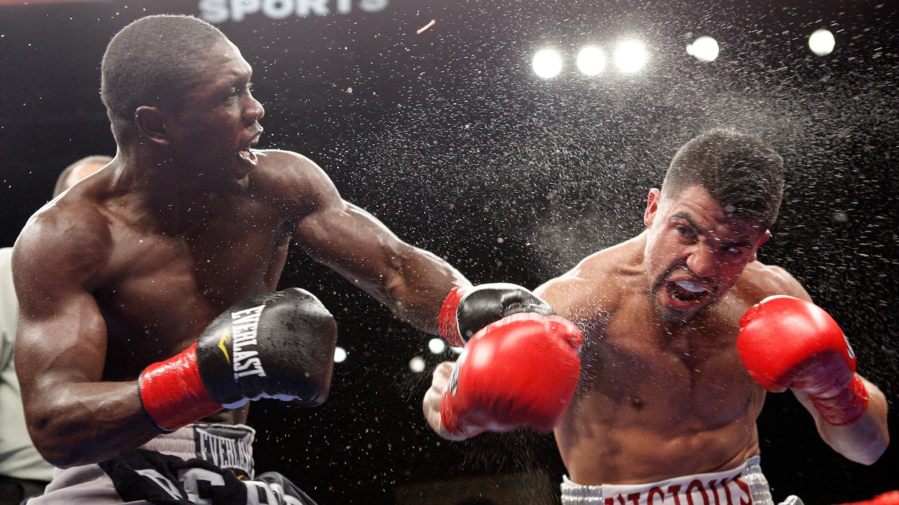 Andre Berto and Victor Ortiz exchange blows in their first meeting in 2011. Photo: HBO