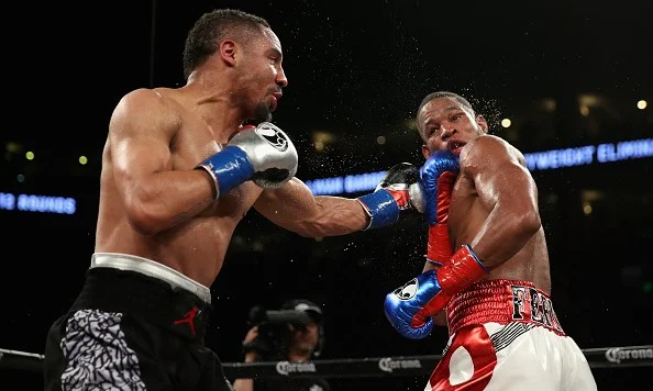 Andre Ward attempts to land a left hook as Sullivan Barrera goes on the defensive. Photo: Ezra Shaw/Getty