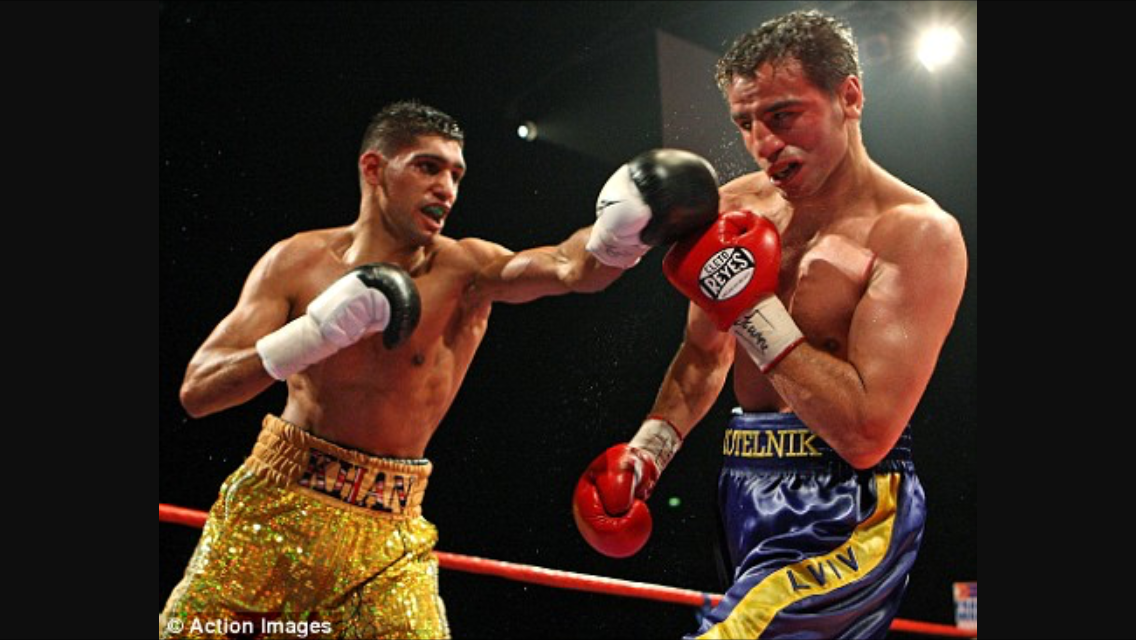 Khan Lands a straight left jab on Kotelnik. Photo: Action Images