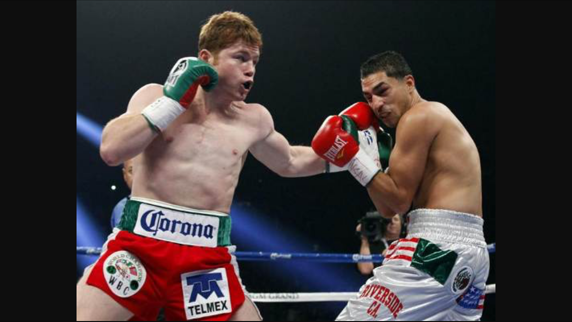 Left hook landed by Canelo Alvarez. Photo: Reuters