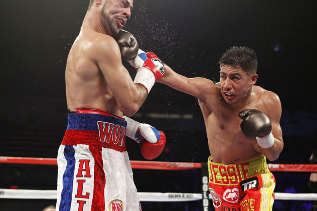 Jessie Vargas lands a right hand on Sadam Ali en route to winning the WBO welterweight title. Photo: Tom Hogan/Hogan Photos/Golden Boy Promotions