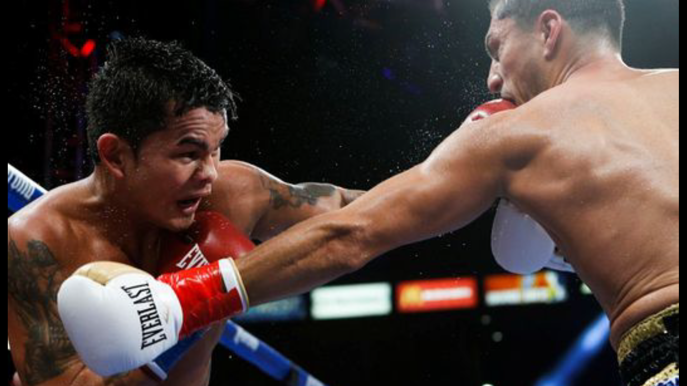 Marcos Maidana lands a left hand on Josesito Lopez. Photo: Esther LIn/Showtime