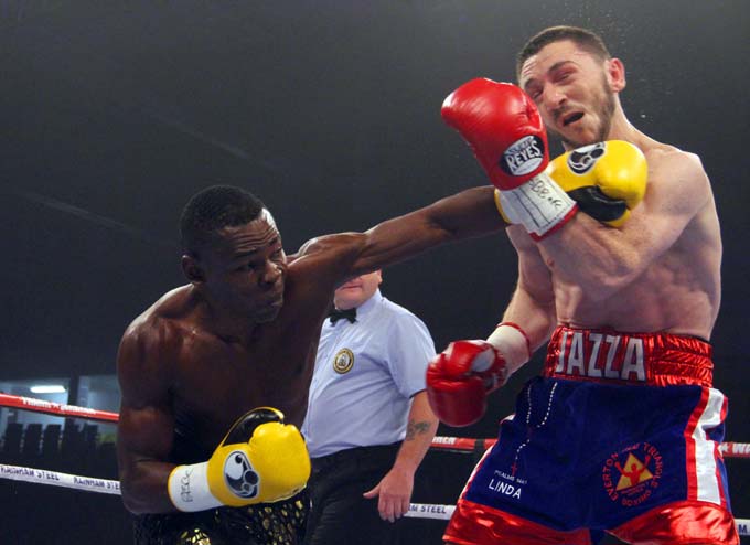 Rigondeaux lands a left hand that breaks Jazza Dickens jaw in Rigondeaux's last fight. Photo: Sumio Yamada