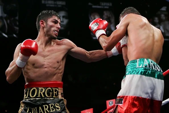 Jorge Linares lands on Oscar Larios. Photo: Ethan Miller/Getty Images Sport