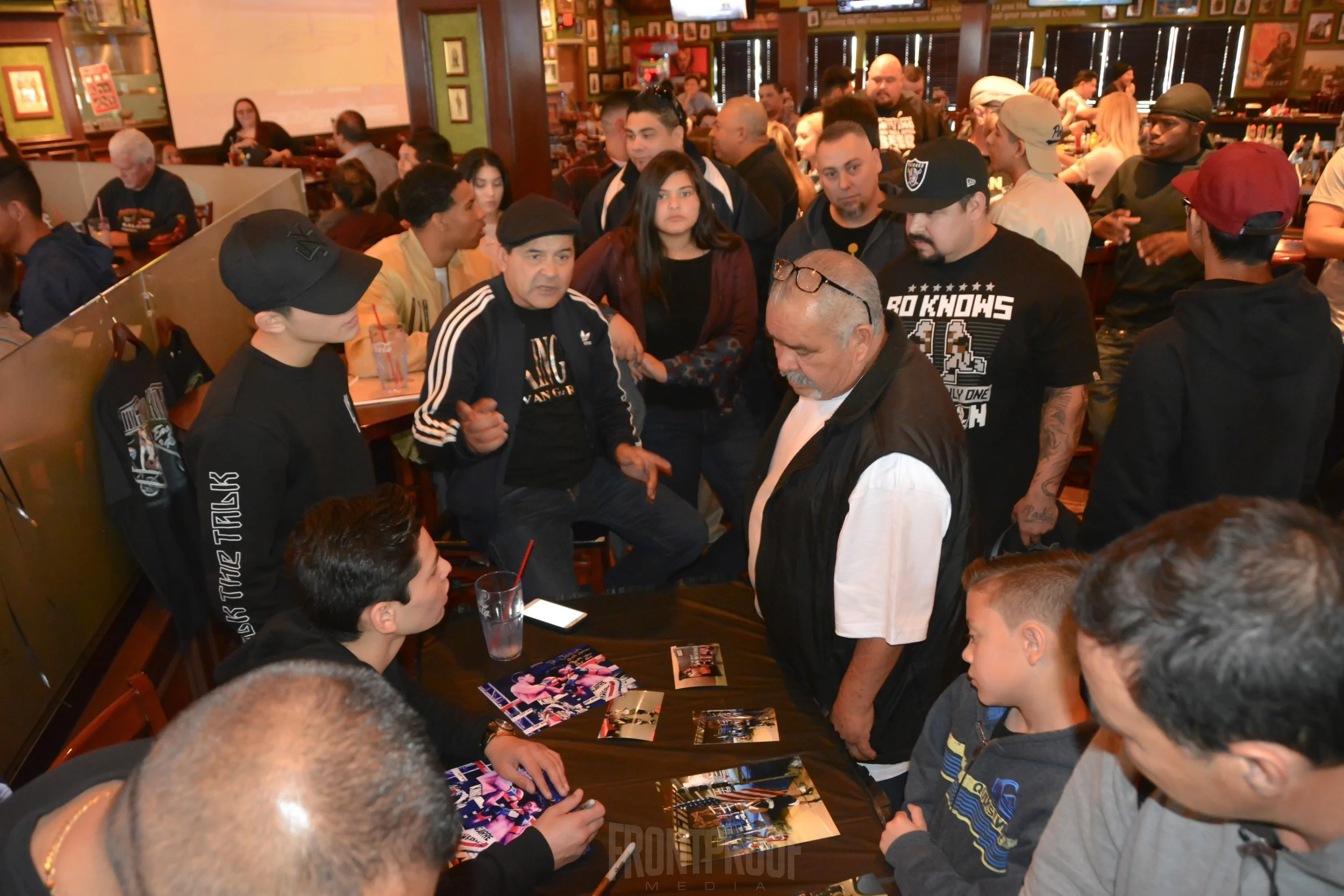 Fans crowd around to meet Golden Boy Promotions' fighter, Ryan Garcia, this past Saturday afternoon in Victorville, California. Photo: Cynthia Saldaña/Frontproof Media.