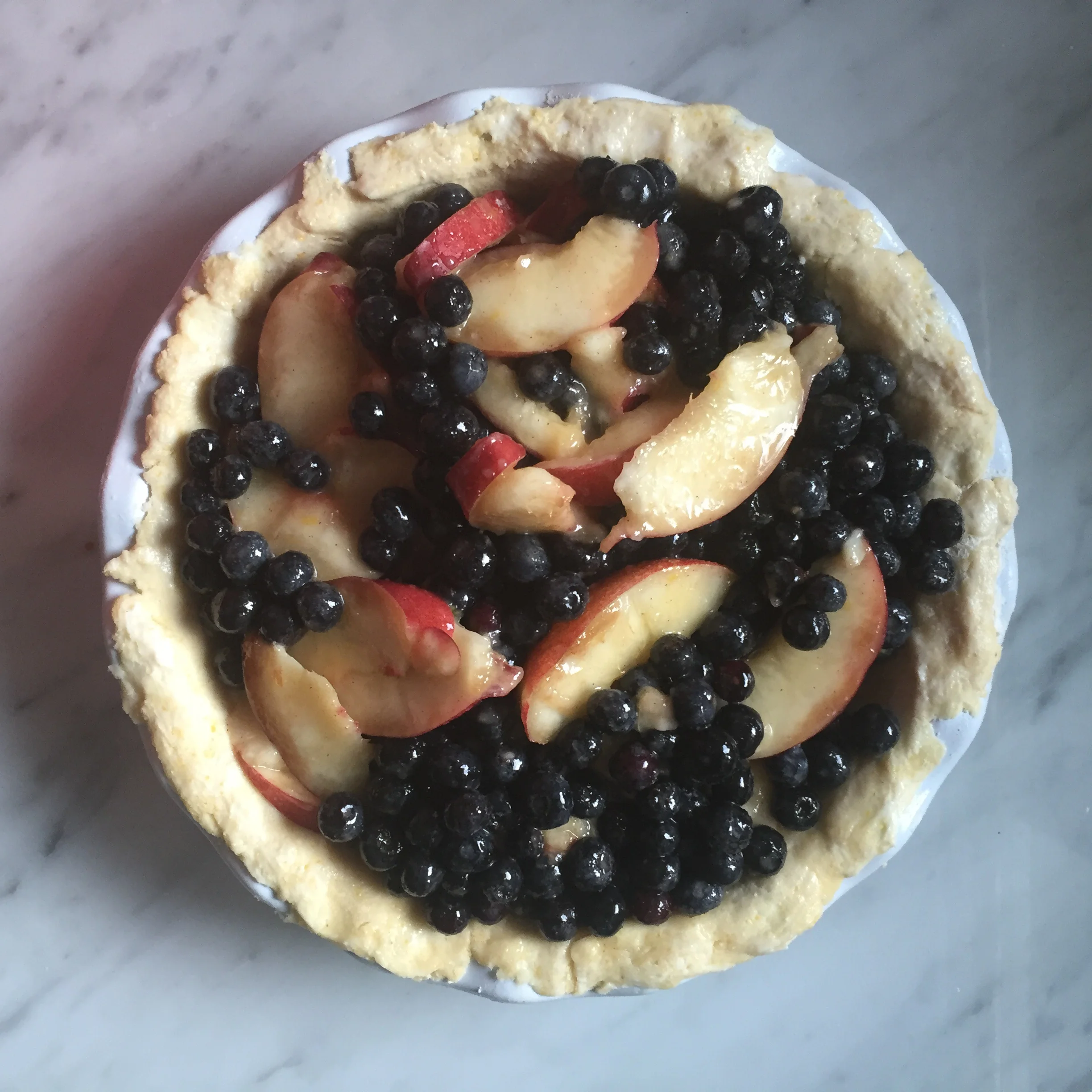 This is the pie I'm working on now- blueberry nectarine with cornmeal crust.