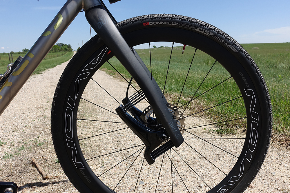 Lauf's Grit SL fork provides 30mm of travel through its leaf spring design. The super lightweight carbon fork will help keep my hands and upper body happier longer by smoothing out the ride just enough without feeling bouncy or mushy. I'm also using Donnelly MSO tires for the DKXL. The MSO's have been my go-to choice over the years and they've worked great in all kinds of conditions. I'm running a 40mm up front and 36mm in the rear. 