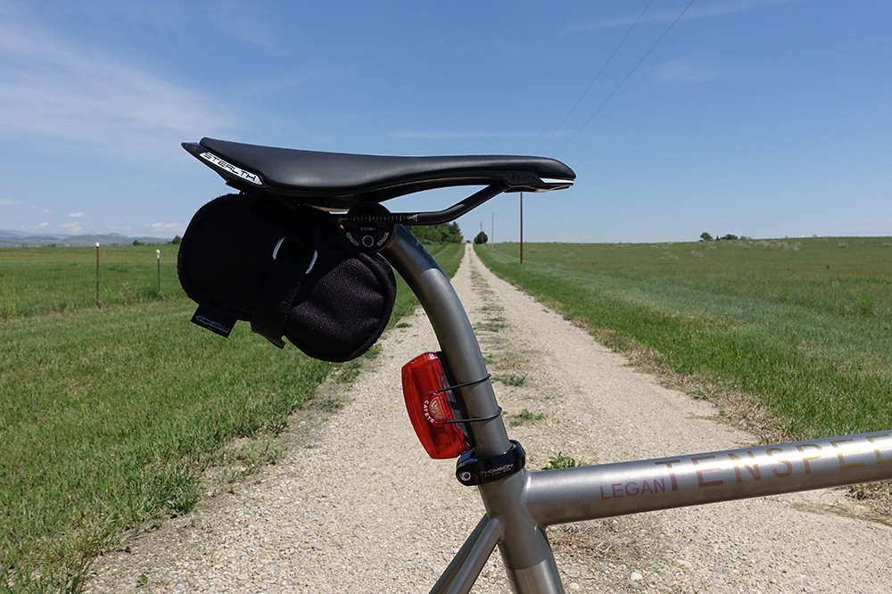 Firefly built a smaller diameter seat post for this gravel machine so I'd have a little extra compliance in the back of the bike. The smaller diameter Ti post flexes a bit more than your standard seat post so the shocks from the road will be reduced before reaching my my body - a small detail but something I think will make a big difference down the long and bumpy road. 