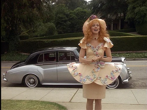 How embarrassing: Jon almost wore the same dress to record this.