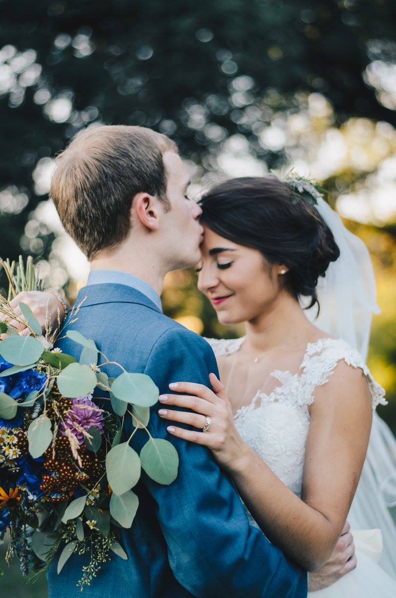 I have to admit that I was hesitant about the color combination of this bouquet after the bride's request, but I'm glad I stuck to my guns and followed through. This nontraditional palette really came together, highlighted by a loose composition. Photo credit: Kat/Eye Studios