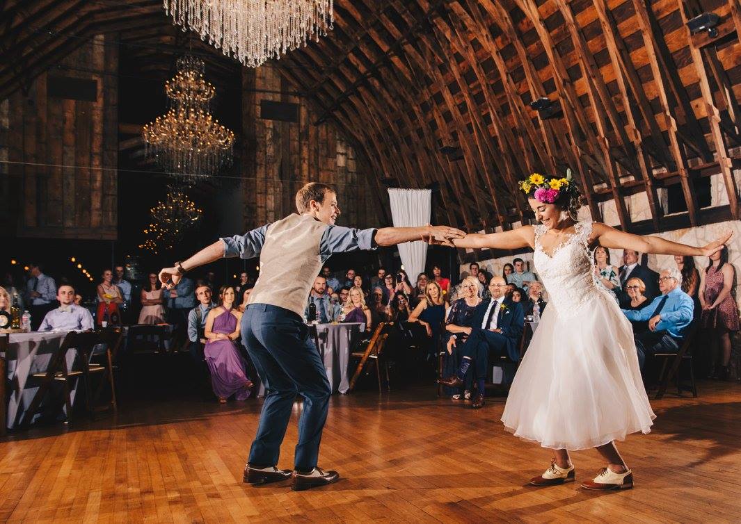 Sarah wanted a flower crown with all of the colors from the wedding, and she got it! Eric and Sarah are dancers, and they really strutted their stuff at the reception with a choreographed show. Photo credit: Kat/Eye Studios