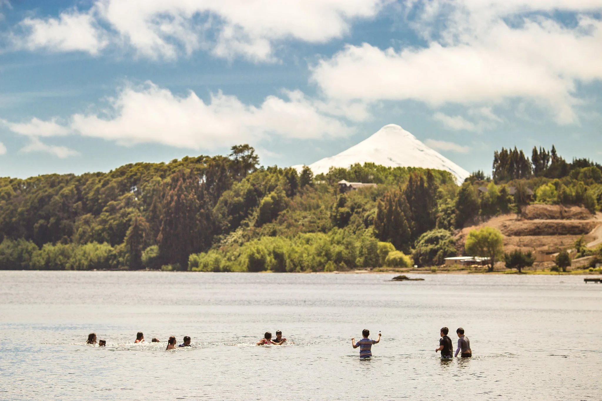 There aren't many countries where you can swim or windsurf on a lake, with a backdrop of a volcano
