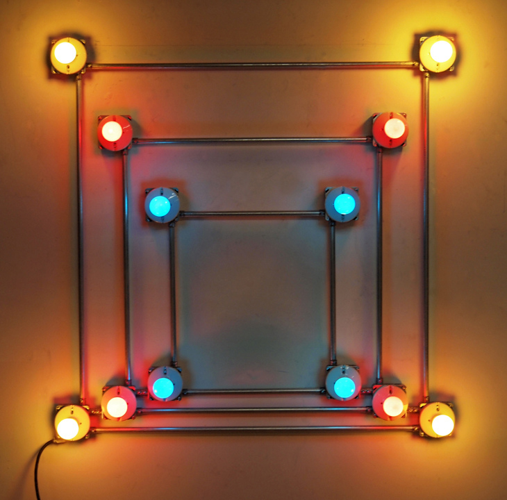 Conduits in Red, Yellow and Blue, 2012 . Galvanized steel, copper wire, porcelain fixtures and ceramic coated light bulbs. 