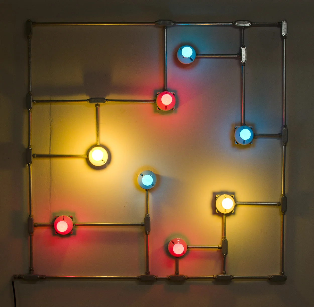 Conduits in Red, Yellow and Blue (Figure 20), 2012. Galvanized steel, copper wire, porcelain fixtures and ceramic coated light bulbs.