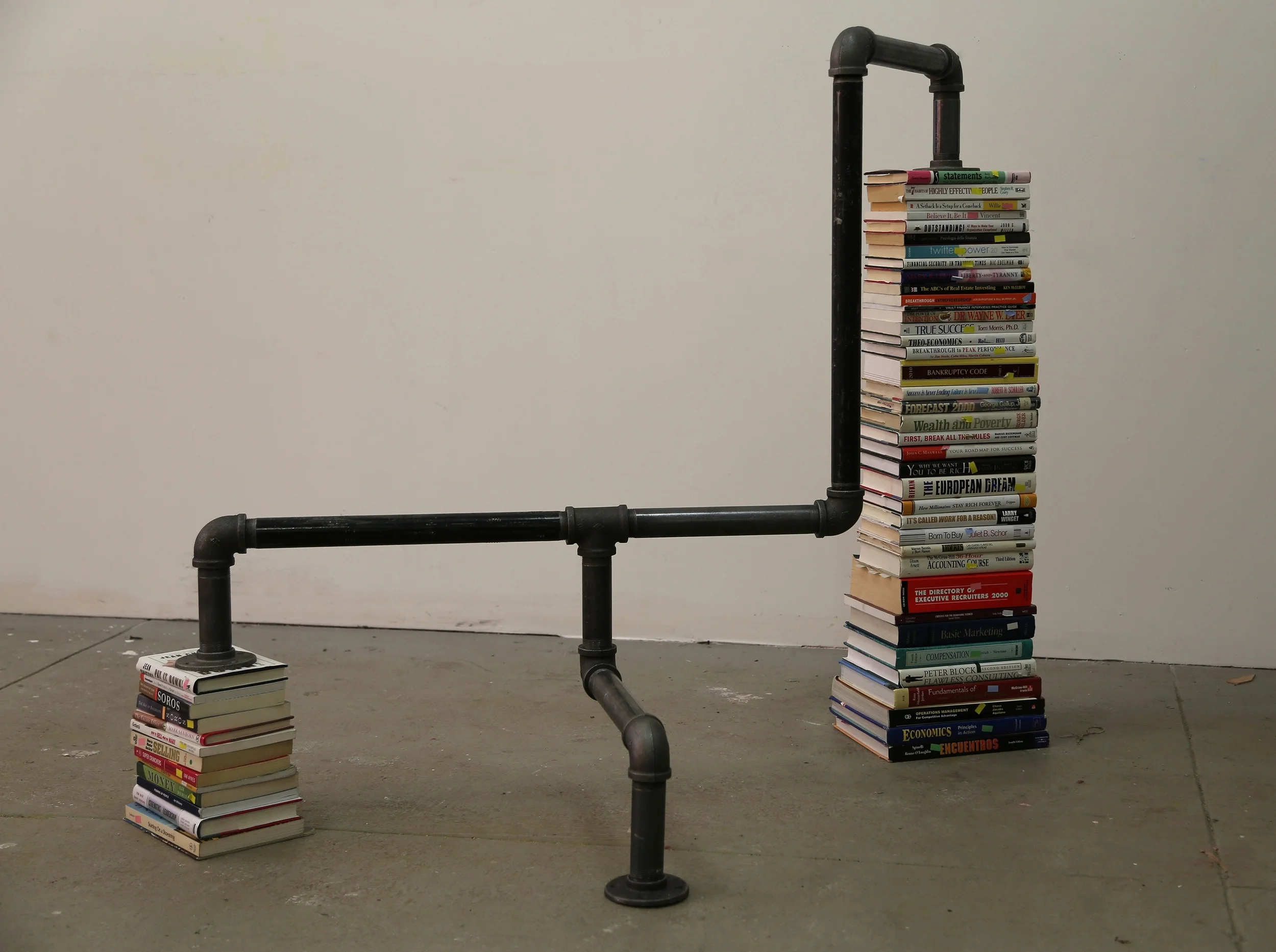 Financial Times (Diagram 3) , 2013. Coated steel pipes, books on finance.