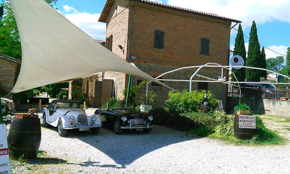 Is it a home? Is it a vintage car dealership? No, it is Tuscany Divine - our favorite restaurant in Chiusi. 