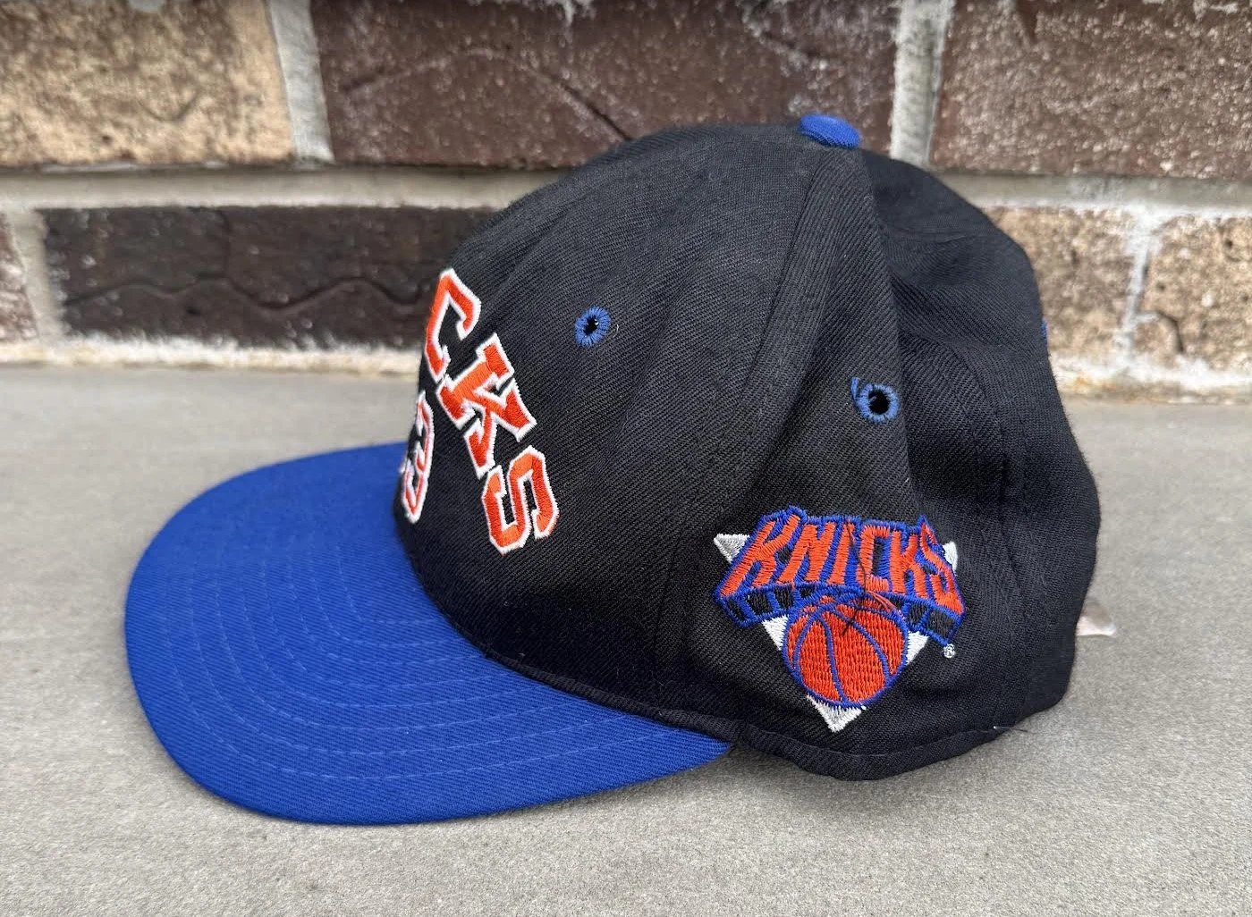 Side of Knicks 33 Ewing Hat.jpg