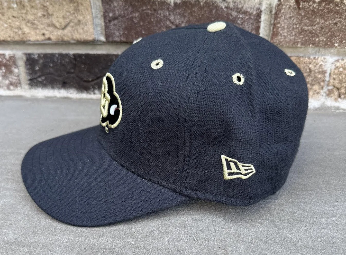 Side of New Era CU fitted hat .jpg