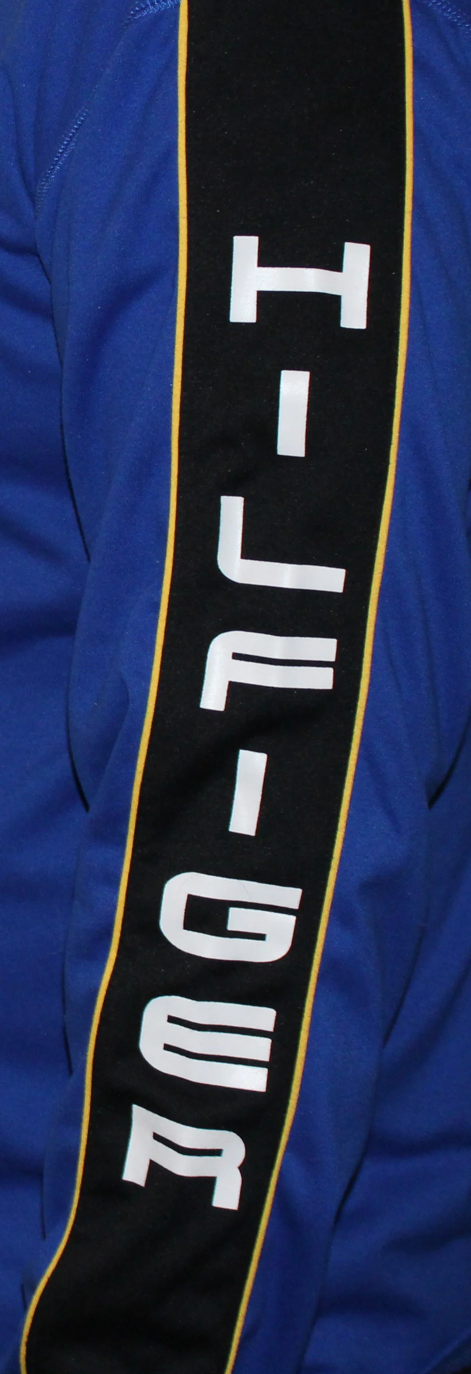 Vintage 90s Tommy Hilfiger Spell Out cycling long sleeve nylon shirt