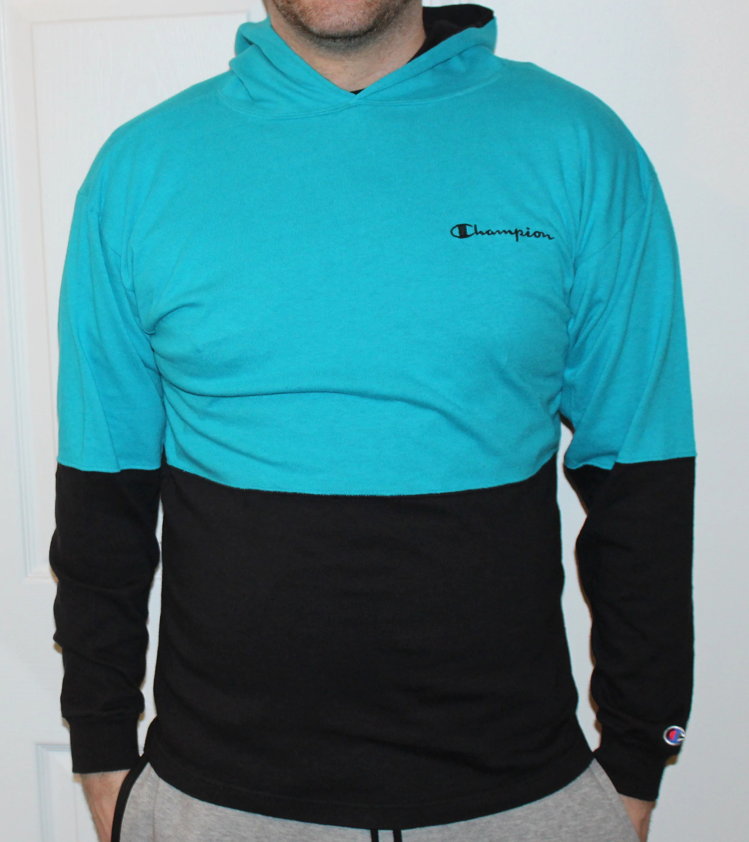 Vintage 90s Champion hoodie with aqua and black split color block
