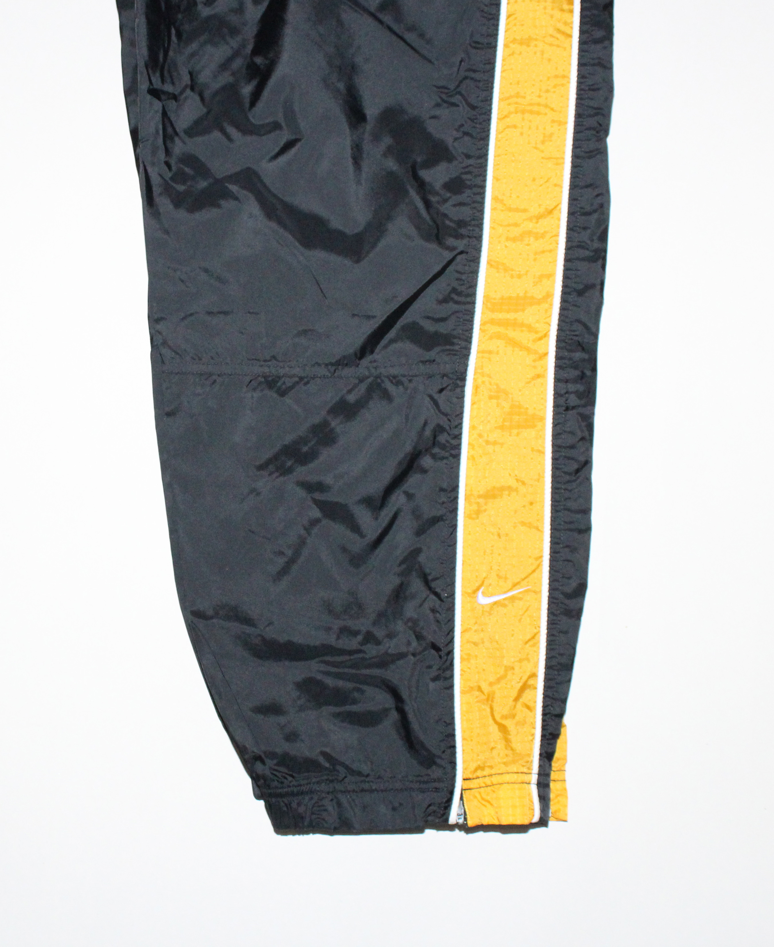 black and yellow nike pants