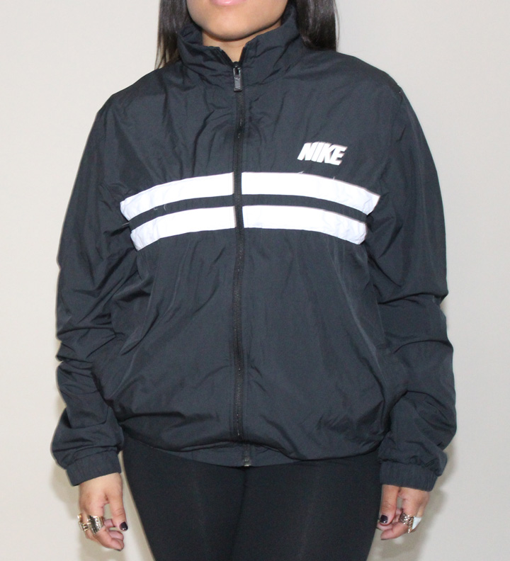 black nike jacket with white stripe