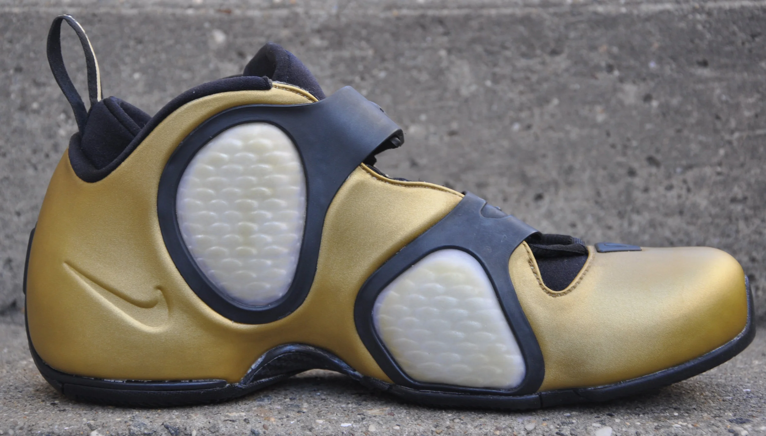 side of Nike Flightposite III BG gold .jpg