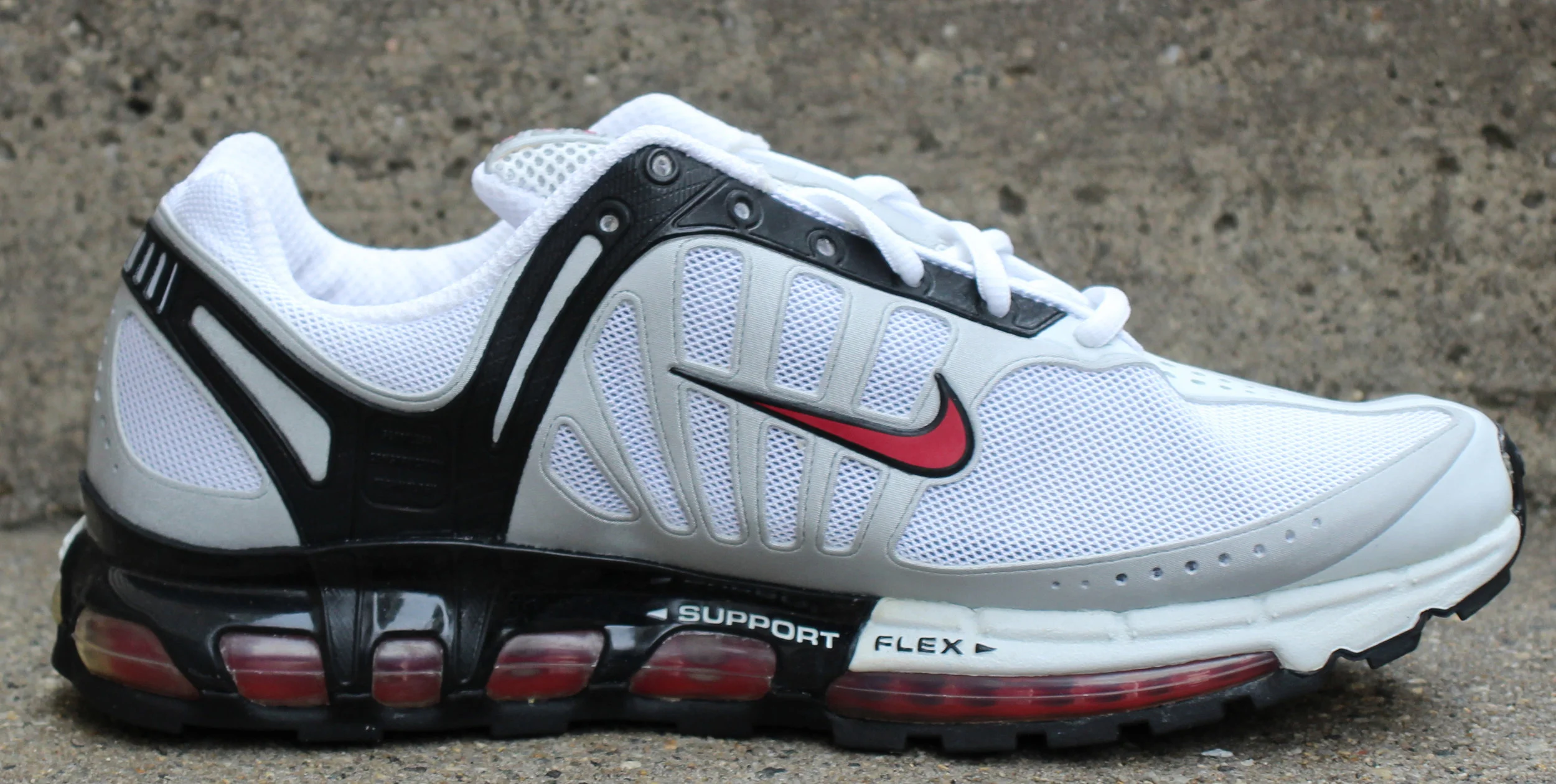 Nike Air Max Solas white, black, and red