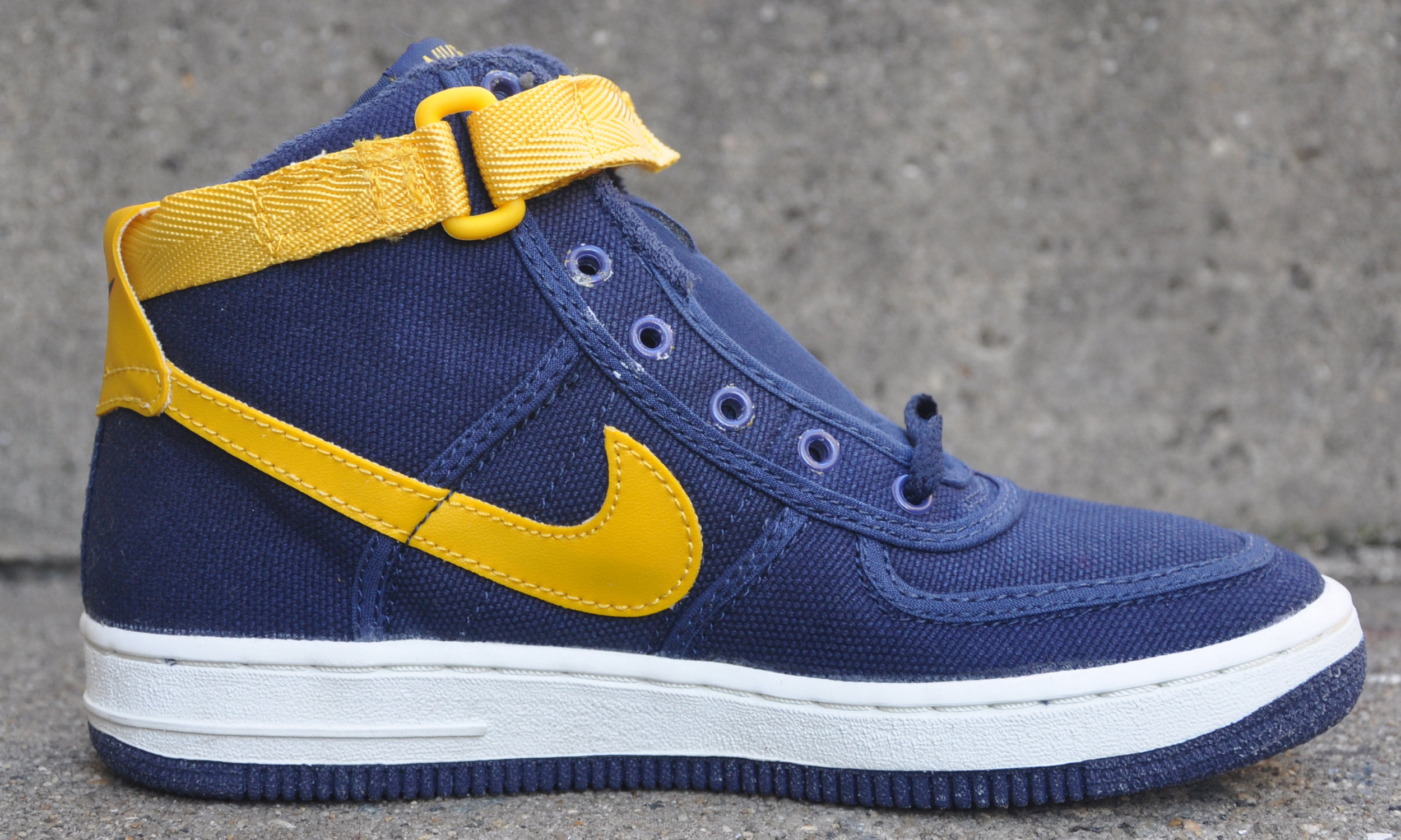 navy blue and yellow high top air force ones