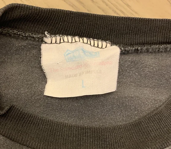 Vintage 90s Bootleg High End Brand ringer t shirt.