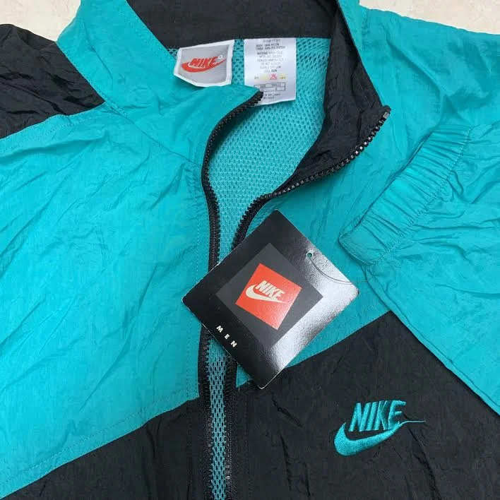 turquoise nike windbreaker