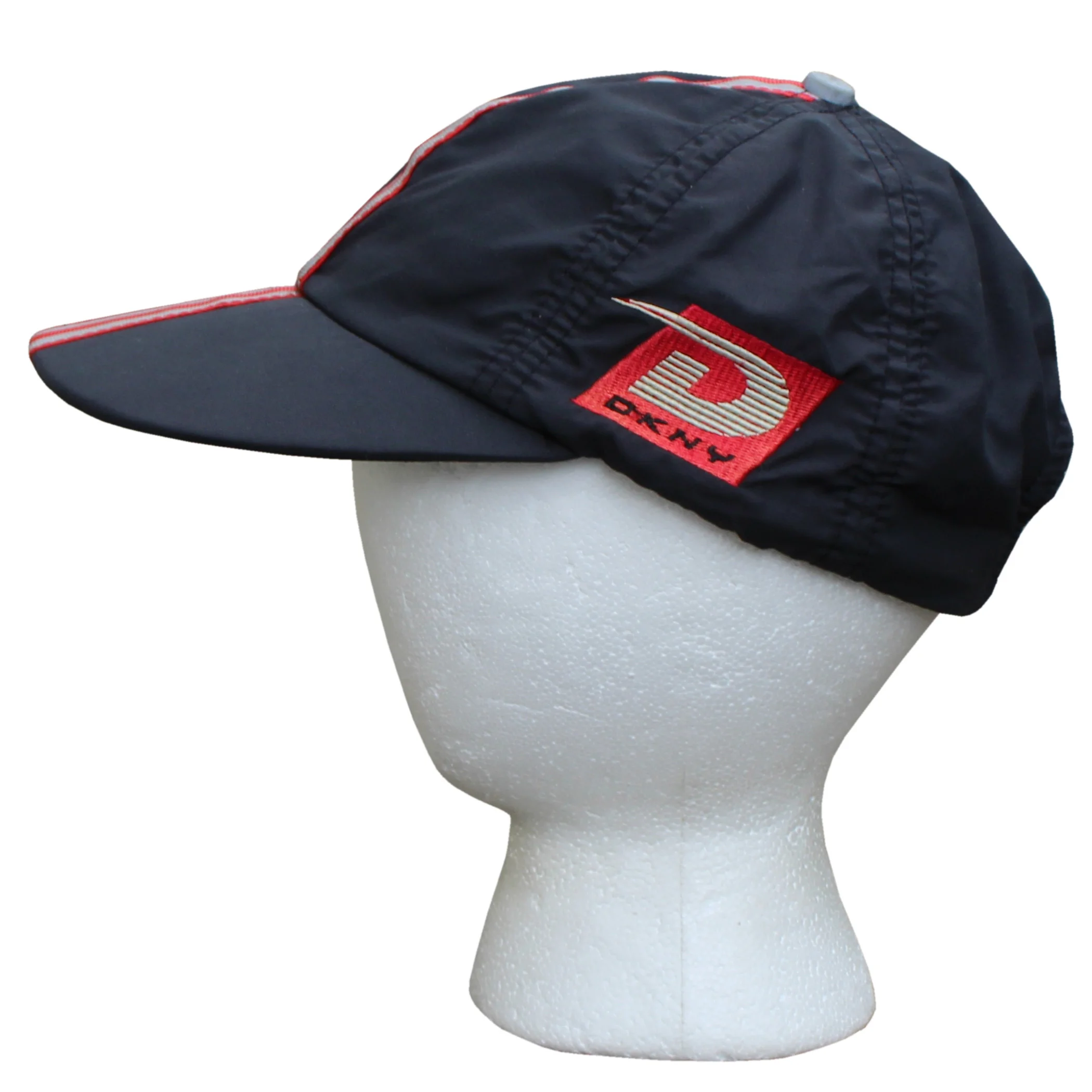 Vintage 90s DKNY Active black, 3M, and red.