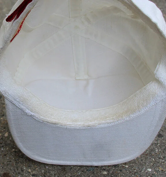 inside of Prada luna rossa hat .jpg