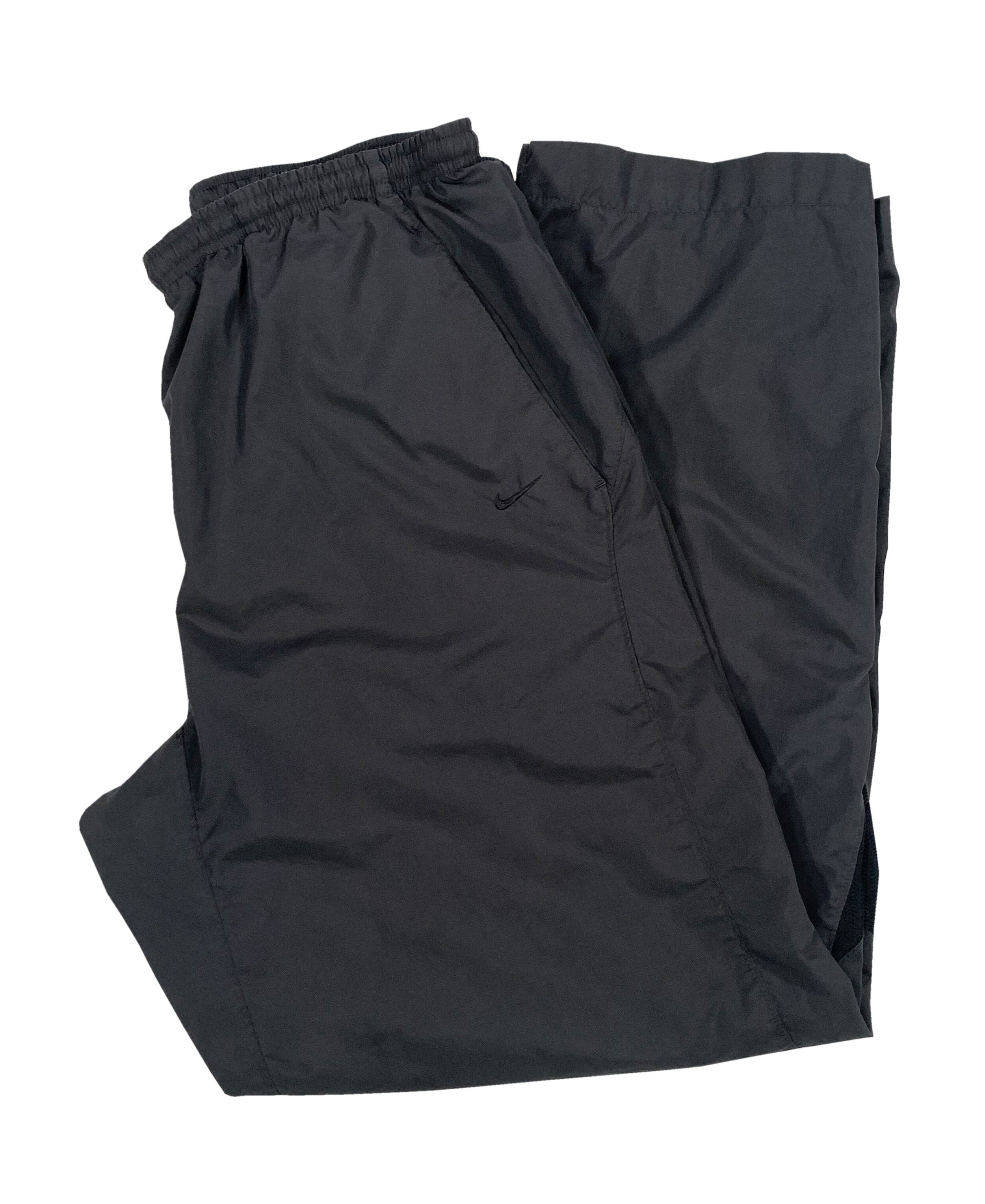 nike grey windbreaker pants.jpg