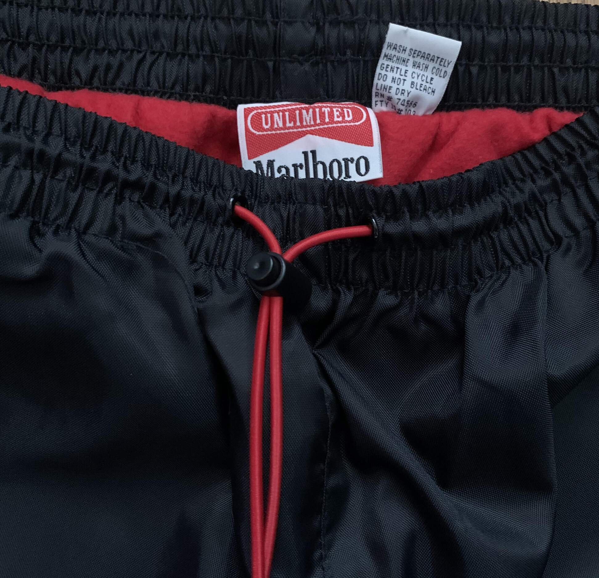 Vintage Marlboro Fleece Lined Black / Red Pants (Size L) — Roots